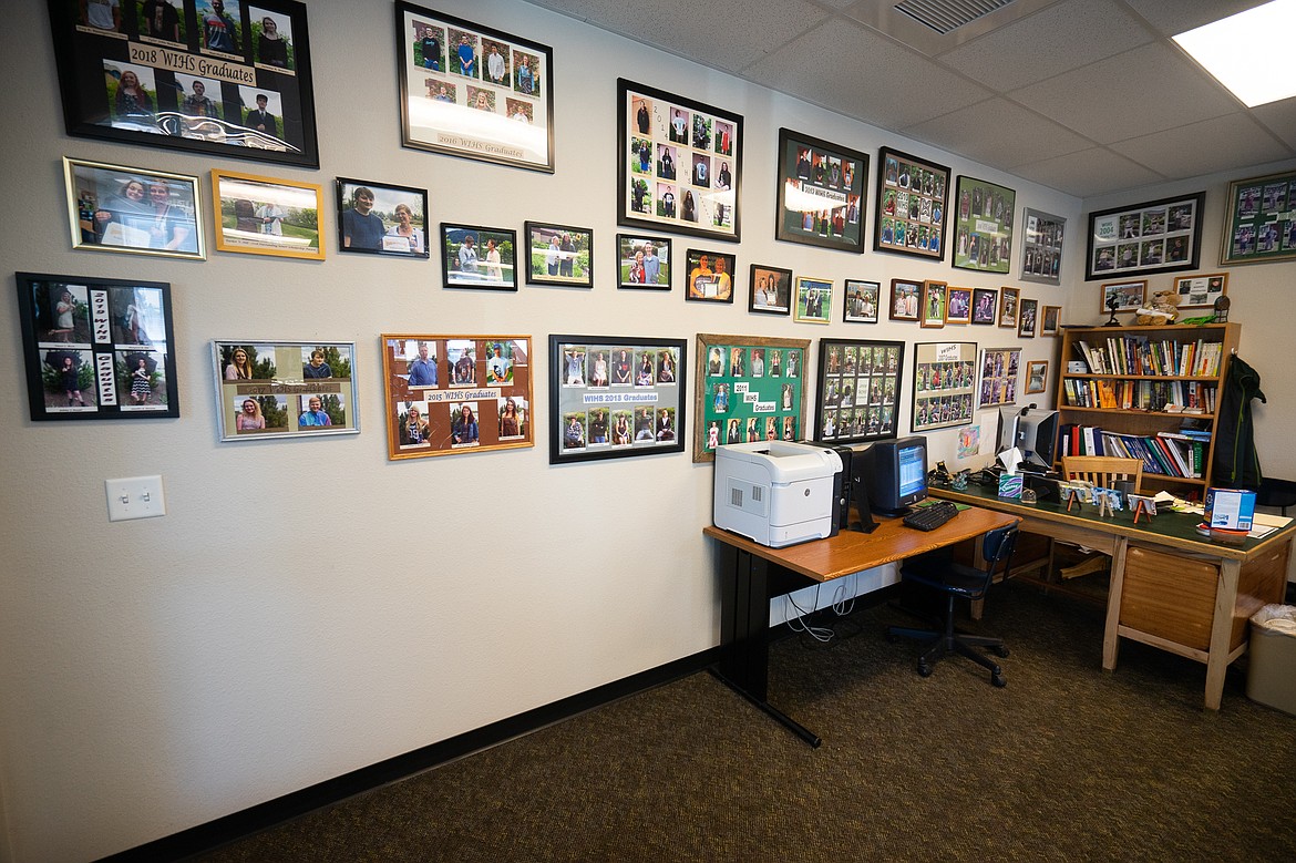 This wall is decorated with the graduates of the Whitefish Independent High School, which celebrates 20 years this month. (Daniel McKay/Whitefish Pilot)