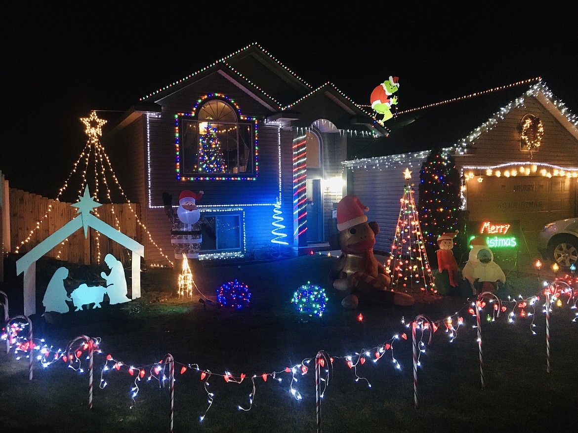 Courtesy photo
Each year people enjoy the colorful front lawn displays of Christmas cheer, like this one at 3117 Thrush Drive in Post Falls. Families bundle up and pile into their cars and take leisurely evening drives around town. The Press wants to know where the best-dressed displays are this year. Send us a photo and the street address to hollyp@cdapress.com, or submit it via the CDAPress app.