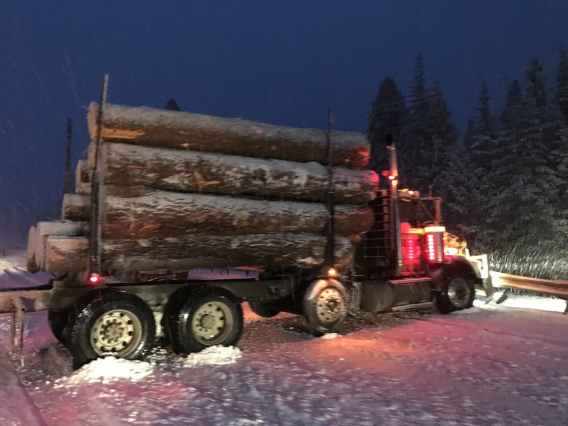 Logging truck collides with car | Coeur d'Alene Press
