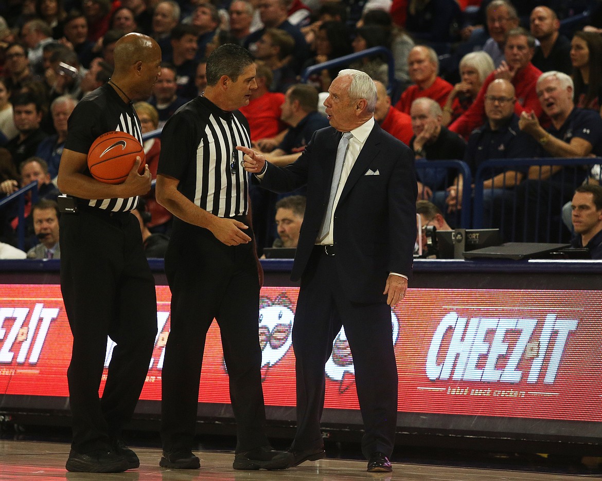 University of North Carolina head coach Roy Williams discusses a call with officials during Wednesday's game against Gonzaga. (LOREN BENOIT/Press)