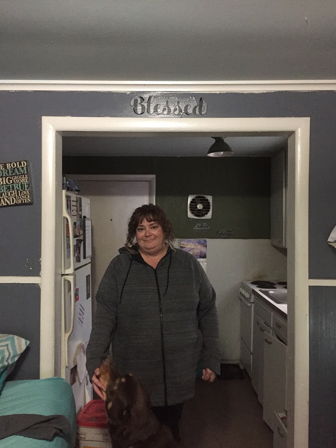 Catrina Hancock stands in her apartment in Circle Park where she has lived for six years. Residents must vacate their apartments by April 30th. (JENNIFER/Passaro)