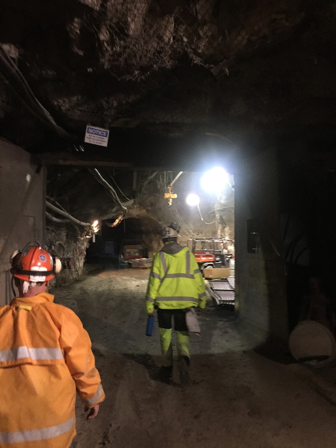 Lucky Friday General Manager Clayr Alexander and retired Hecla Co. Chief Operating Officer Larry Radford walk onto the 4,900 foot level of the hard rock mine. (JENNIFER PASSARO/Press)