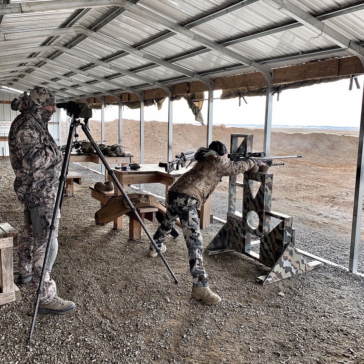 Rathdrum 14 year old Jake Millard shoots over a typical barricade at Washington's Rock Lake Rifle Range, with pro shooter Nick Gadarzi spotting.

Sam Millard