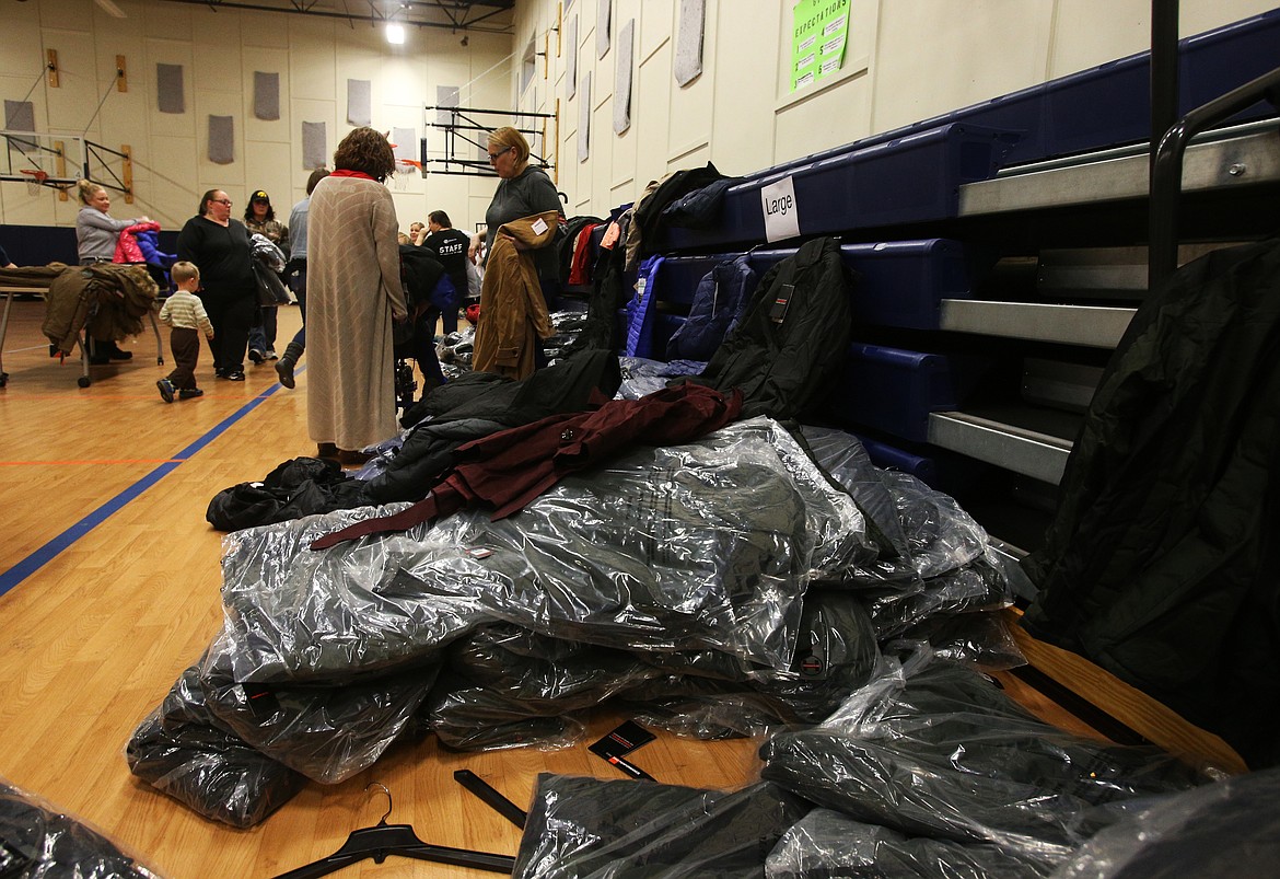 Over 750 coats were distributed to kids at the Boys and Girls Club on Friday. (LOREN BENOIT/Press)