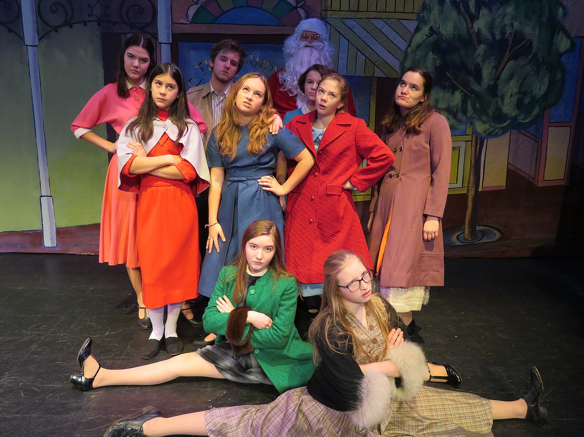 Bigfork Children&#146;s Playhouse Theatre&#146;s Santa, Tyler and the Higbee Elves in &#147;A Christmas Story - The Musical&#148;: Back Row: Micah Dunham, Tyler Williamson, Seth Price and Kinsey Voelker. Middle Row: Lille Suffia, Macy Cotton, Ali Putzler and Faith Elhajj. Splits Girls: Payton Kallenberger and Grayson Johnson.