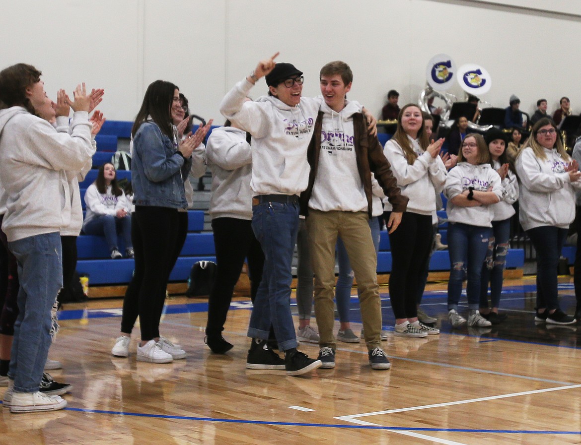 CHS junior Harry Blackstone celebrates being No. 1 in the state with senior Logan Jaggi during an assembly Thursday. (DEVIN WEEKS/Press)