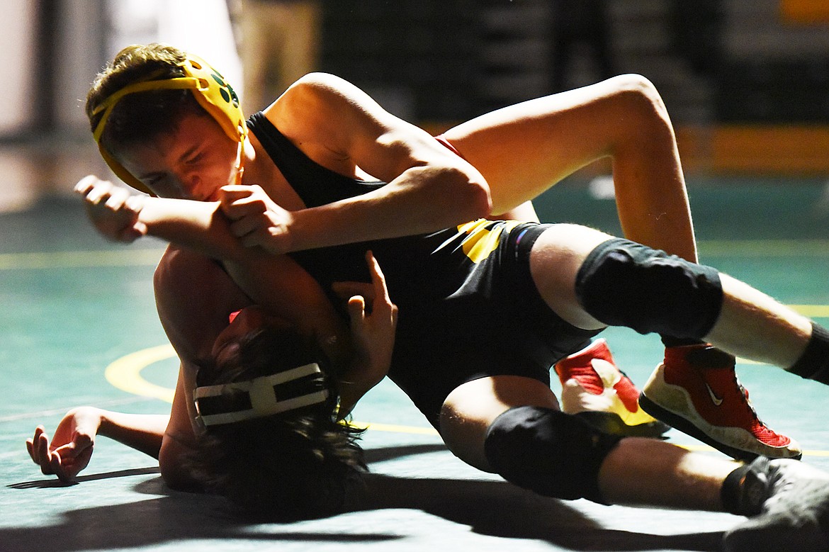 Whitefish's Kadin Brown wrestles Browning's Chris Hall at 113 lbs. at Whitefish High School on Tuesday. (Casey Kreider/Daily Inter Lake)