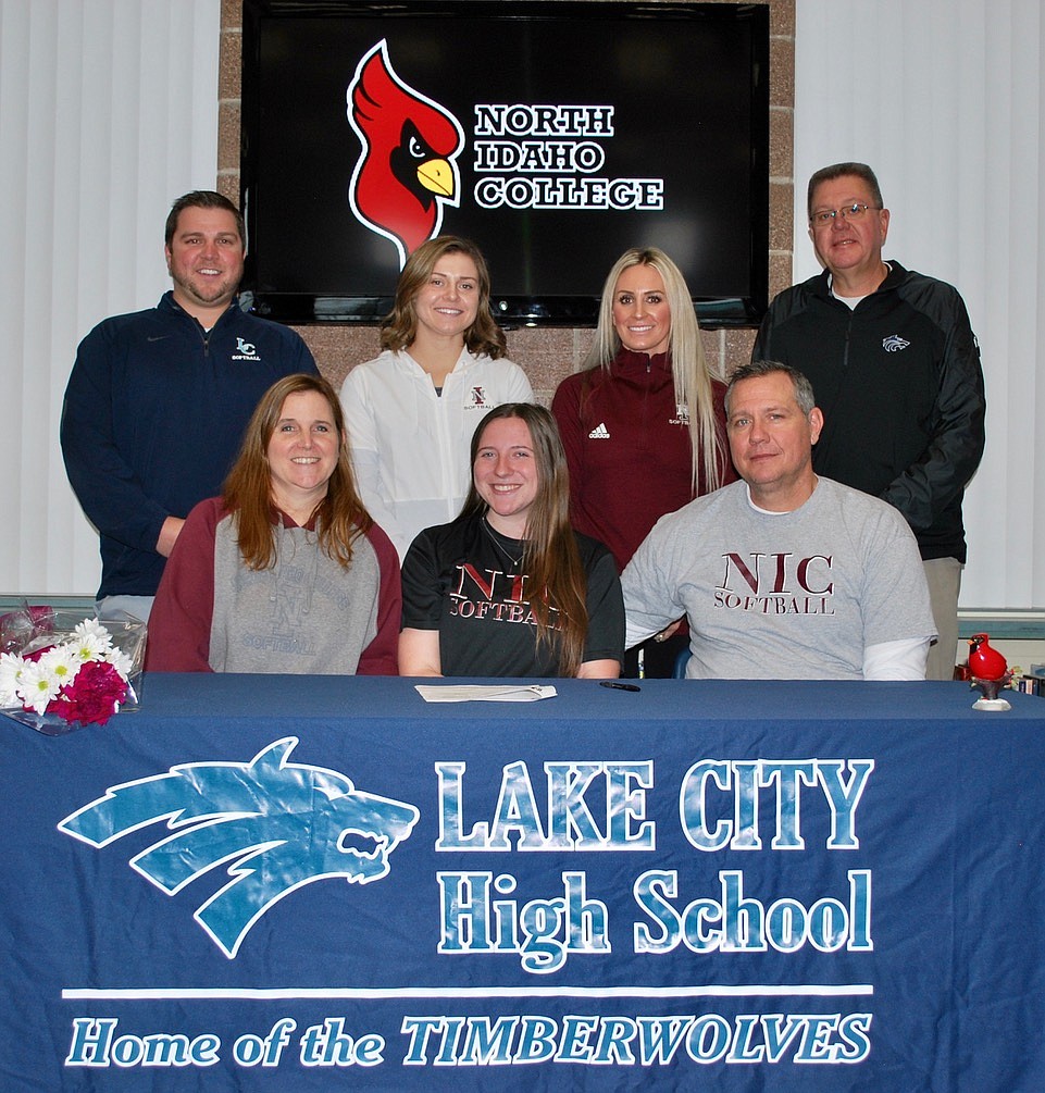 Courtesy photo
Lake City High senior Amanda Curry recently signed a letter of intent to play softball at North Idaho College. Sitting from left are Sandra Curry, mom; Amanda Curry and Robert Curry, dad; and standing from left, Jesse Lenz, Lake City High softball coach; Jordyn McCracken, NIC assistant softball coach; Shay Fuson, NIC head softball coach; and Jim Winger, Lake City High athletic director.
