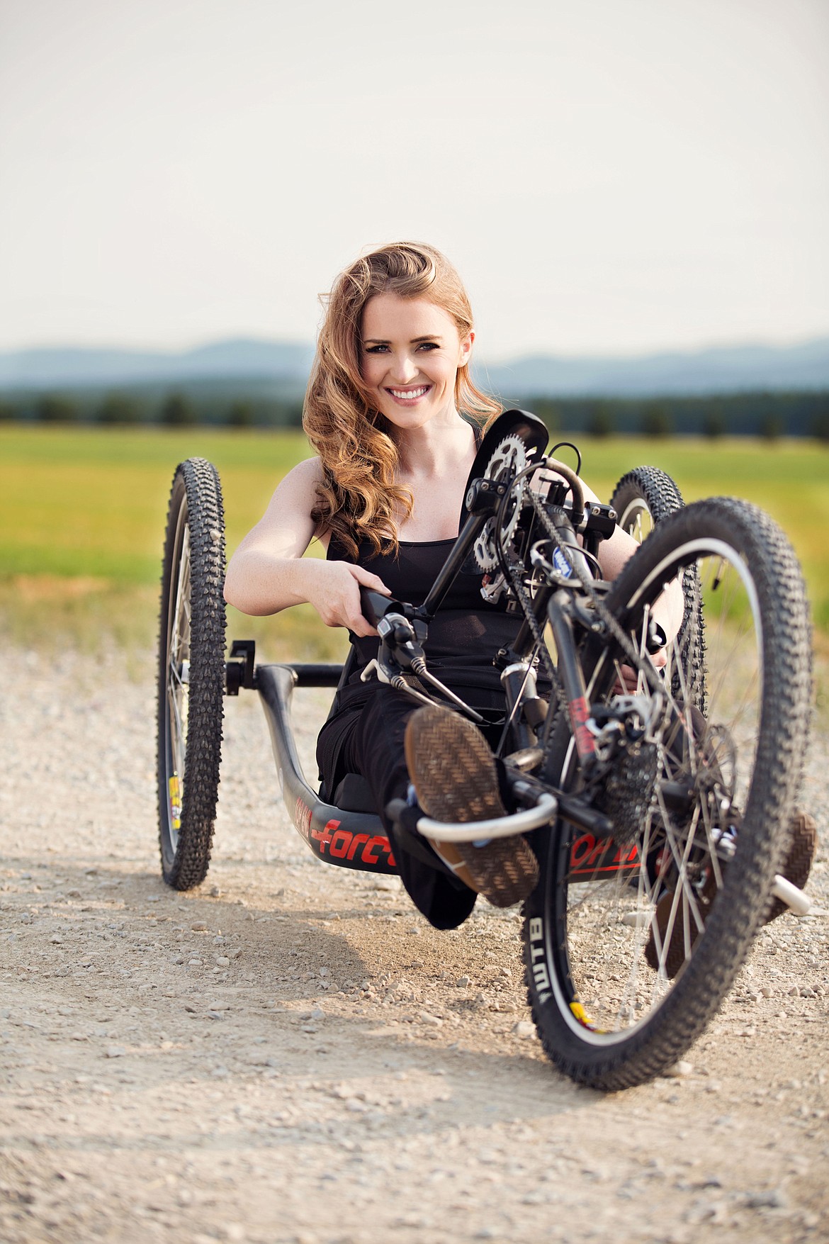 Starla Hilliard-Barnes, shown on a hand-cycle, co-founded Moving Forward Adaptive Sports with her husband, Shannon Barnes. (Photo by Amber Siderius)