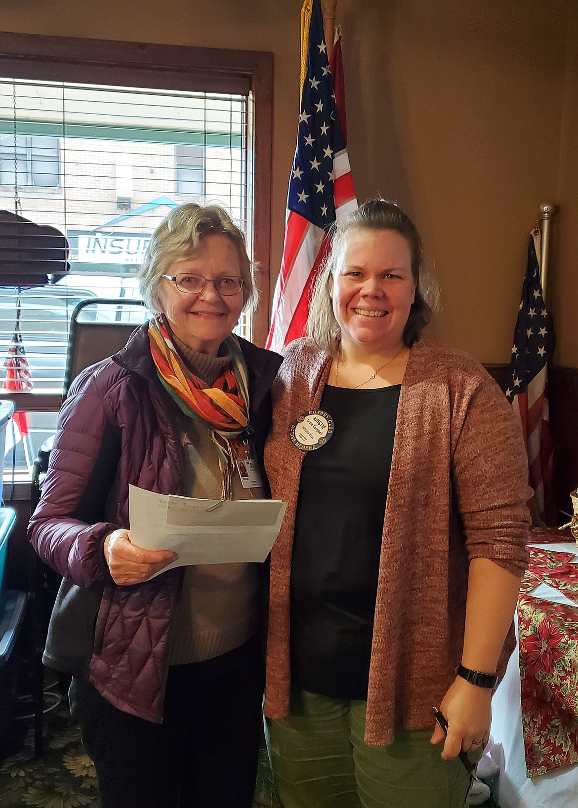 Courtesy photo
Kristie Campbell of Bonners Ferry Rotary, right, presents Denise Thompson, Lead Hospice Volunteer in Bonners Ferry for Bonner General Health Community Hospice, with a $100 donation in memory of Bill Goodanetz from Bonners Ferry Rotary on Nov. 26. For more information about Bonner General Health Community Hospice please visit BonnerGeneral.org or call 208-265-1179.