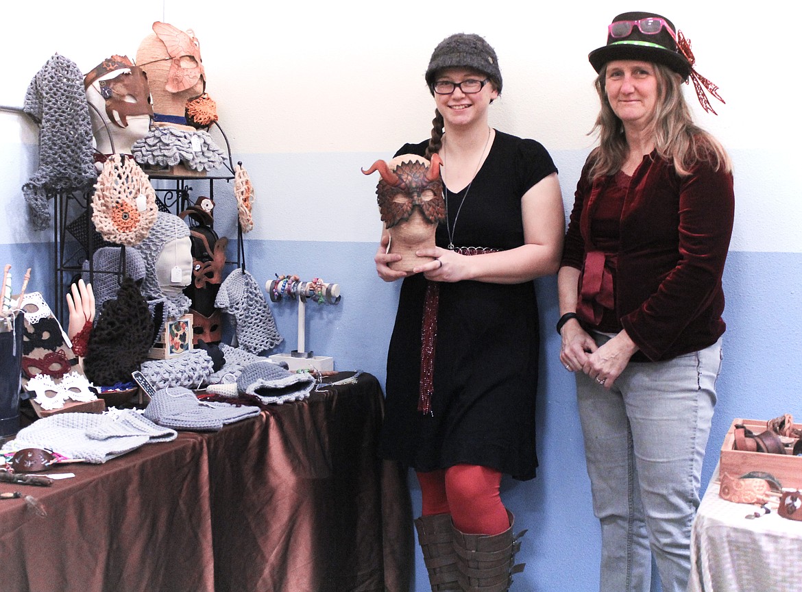 Photo by TONIA BROOKS
Kalika and Darla Reed of local Naples business, KD Steampunk, show off Kalika&#146;s hand made mask offered for sale during the craft fair.