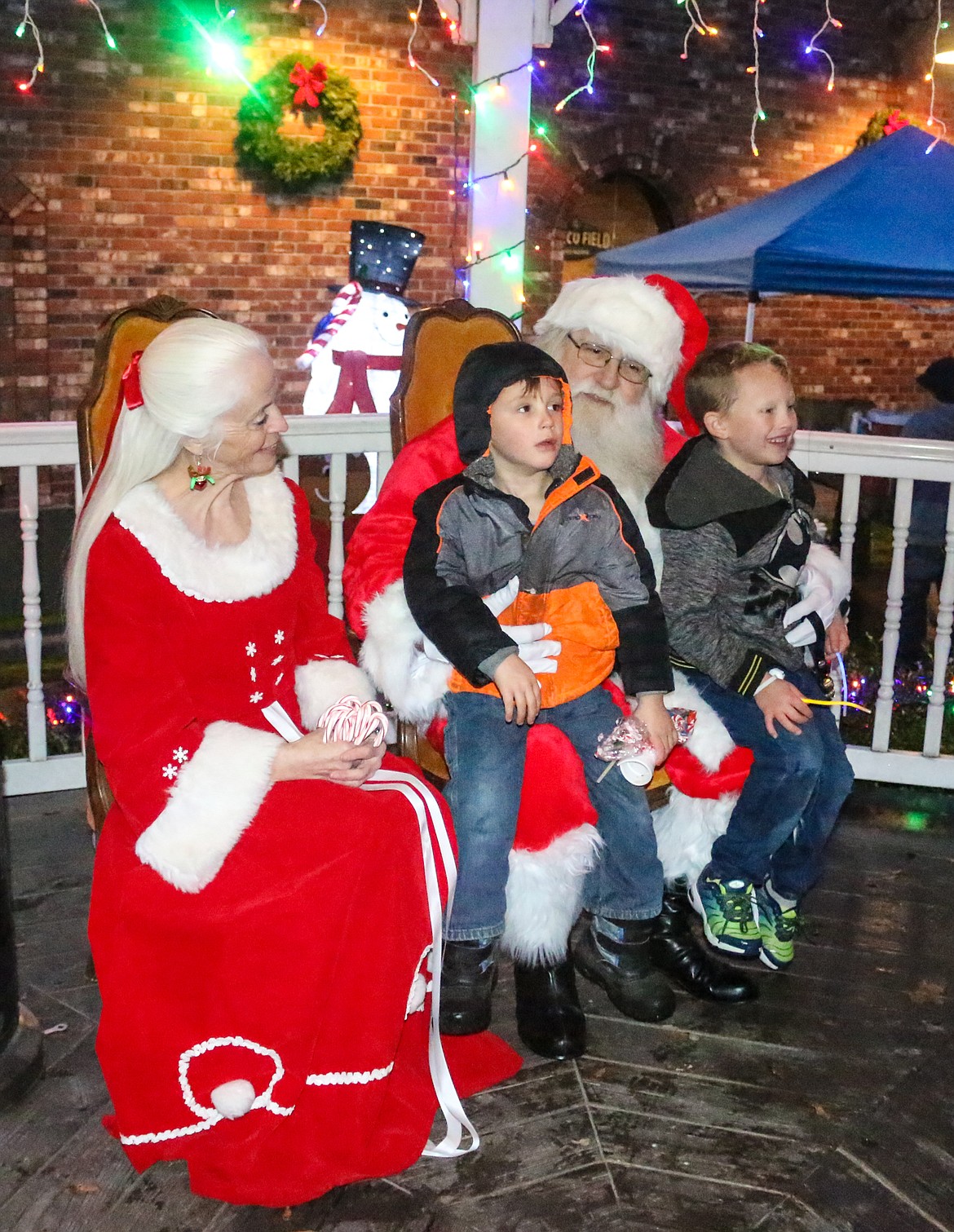 Photo by MANDI BATEMAN
Wyatt Bustillos and Gabriel Crum got the chance to sit on Santa&#146;s lap.