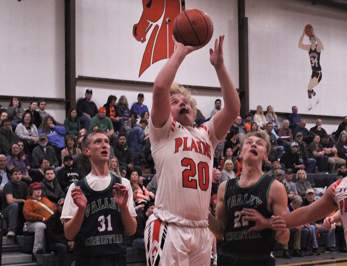 Plains&#146; Jake Weyers goes up for a layup against Valley Christian in Friday&#146;s game. (John Dowd/Clark Fork Valley Press)