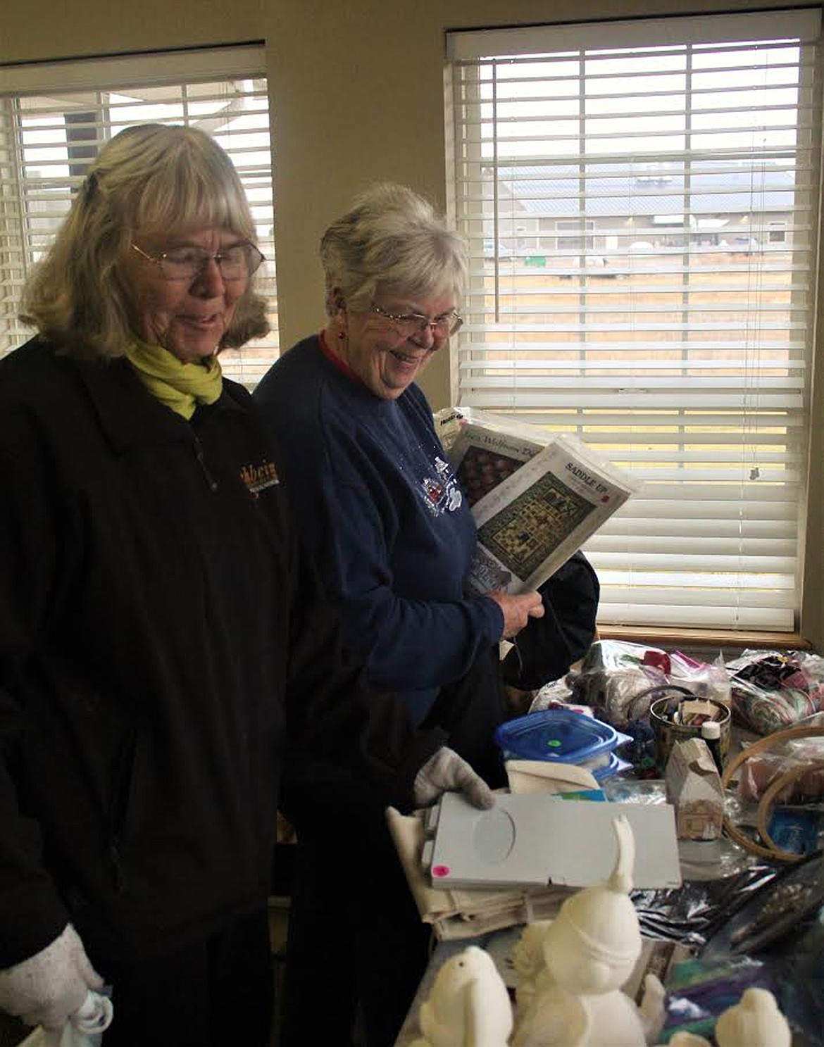 Shirley King and Judy Stephens shop through the Long-Term Care Bazaar last Thursday morning at Clark Fork Valley Hospital. (John Dowd/Clark Fork Valley Press)