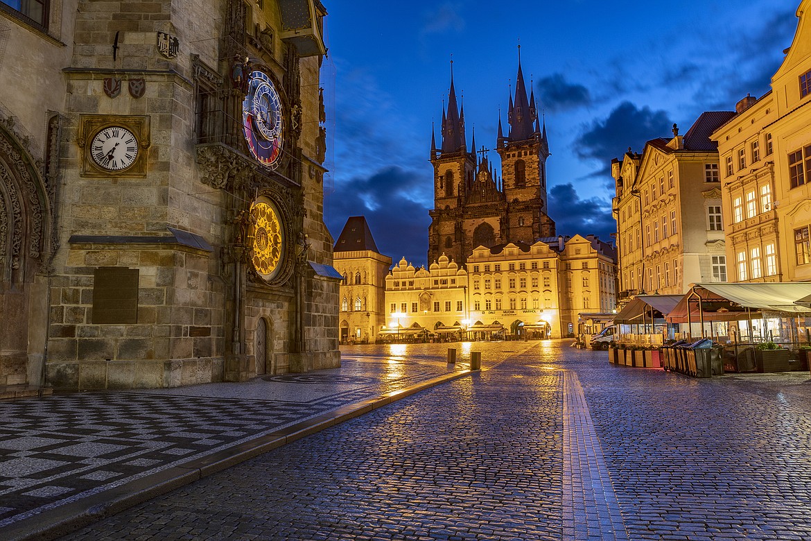 Astronomical Clock and T&yacute;n Church at dawn in Prague, Czech Republic. (Chuck Haney photo)