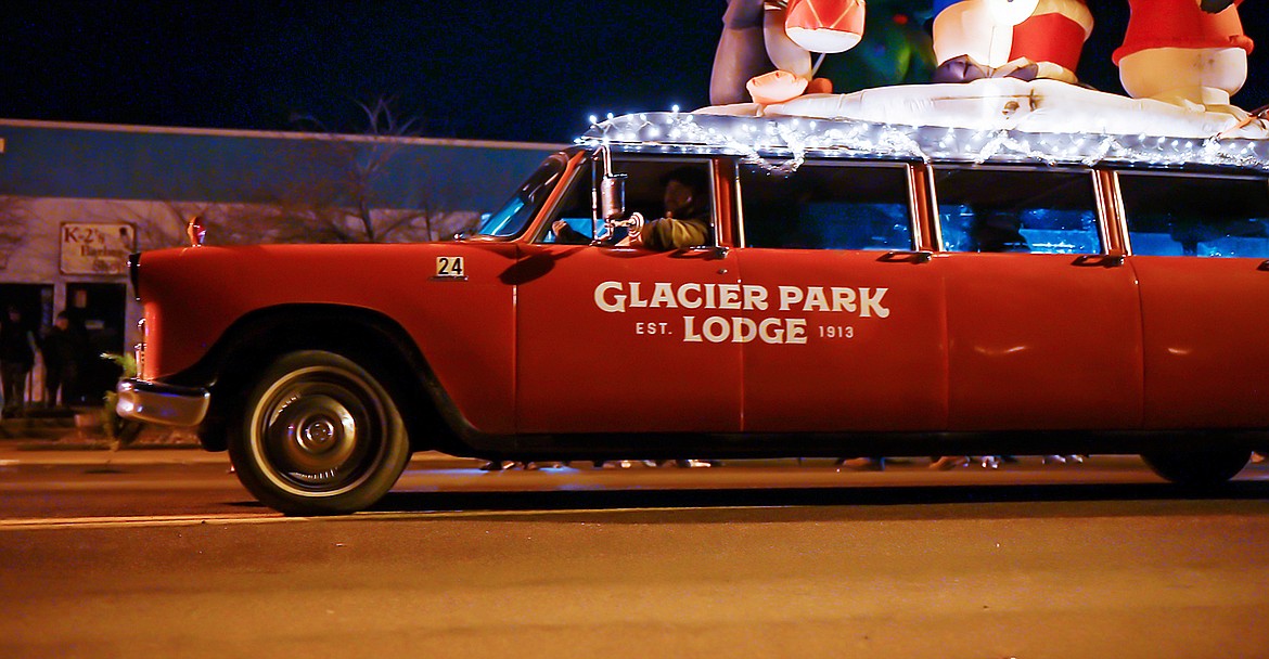 The Glacier Park Lodge float cruises through the parade.