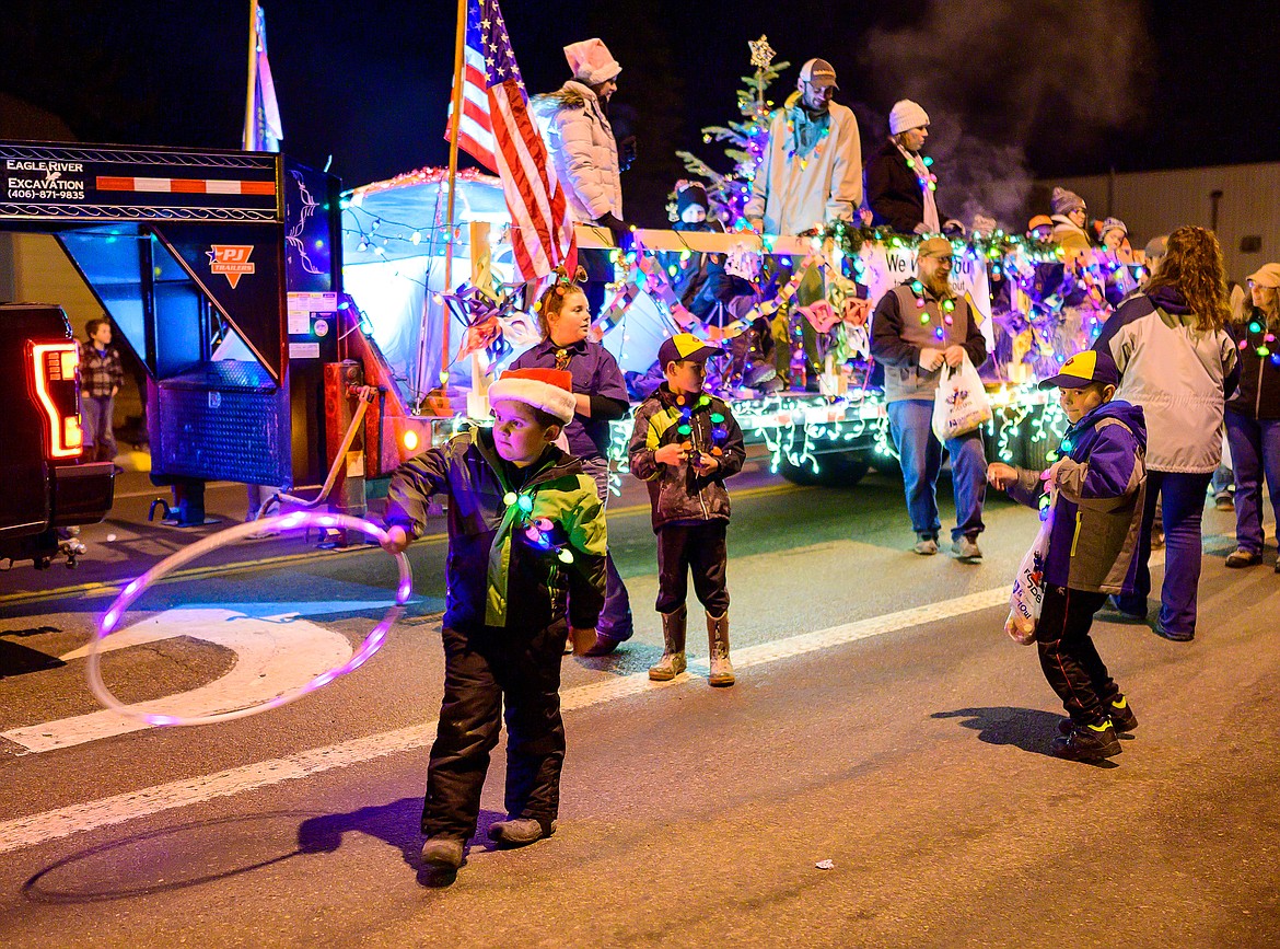 Scouts walk in the parade.