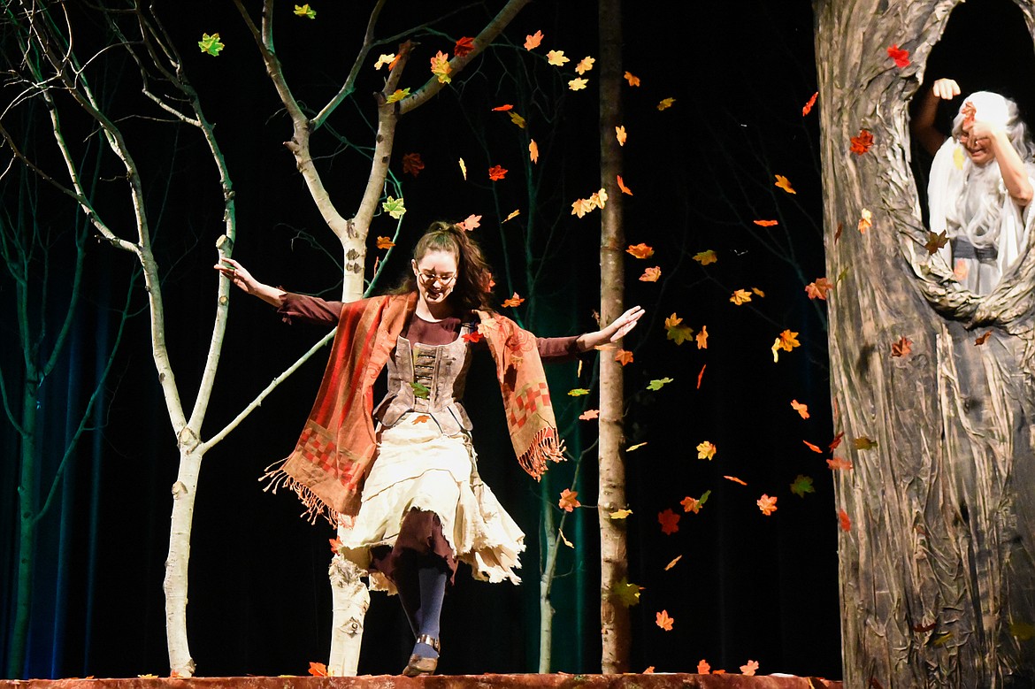 Cinderella (Sophie Sieh) dances under falling leaves during a dress rehearsal of Whitefish Theater Company's &quot;Into the Woods.&quot; (Daniel McKay/Whitefish Pilot)