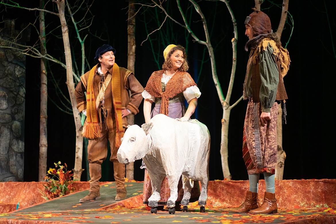 The Baker and his wife (Rob Koelzer and Joy James) make a deal for Jack&#146;s (Soloman Franchi) cow &#8211; in exchange for some magic beans &#8211; during a dress rehearsal of Whitefish Theater Company&#146;s &#147;Into the Woods.&#148; (Daniel McKay/Whitefish Pilot)