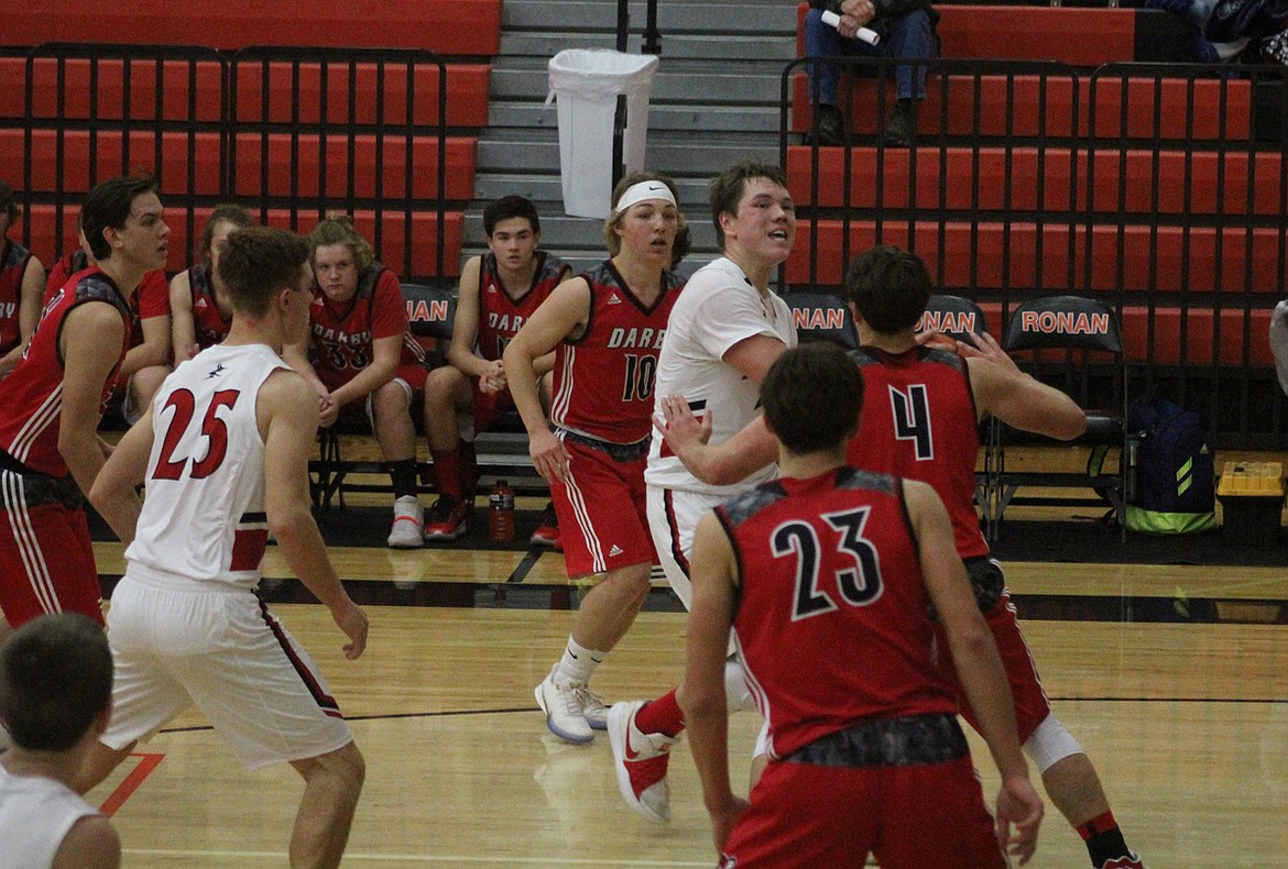 Noxon&#146;s Rylan Weltz drives toward the basket against Darby during Friday&#146;s game in the Ronan tip-off tournament. (John Dowd/Clark Fork Valley Press)