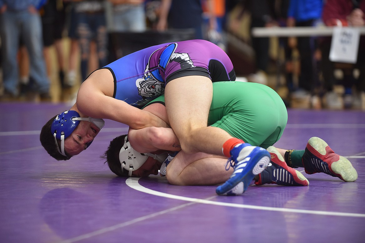 Mission-Charlo&#146;s Isaac Dumontier beat Belgrade&#146;s Gage Meyer, 8-6, at the Owen Invitational Friday in Pablo. (Scott Shindledecker/Lake County Leader)