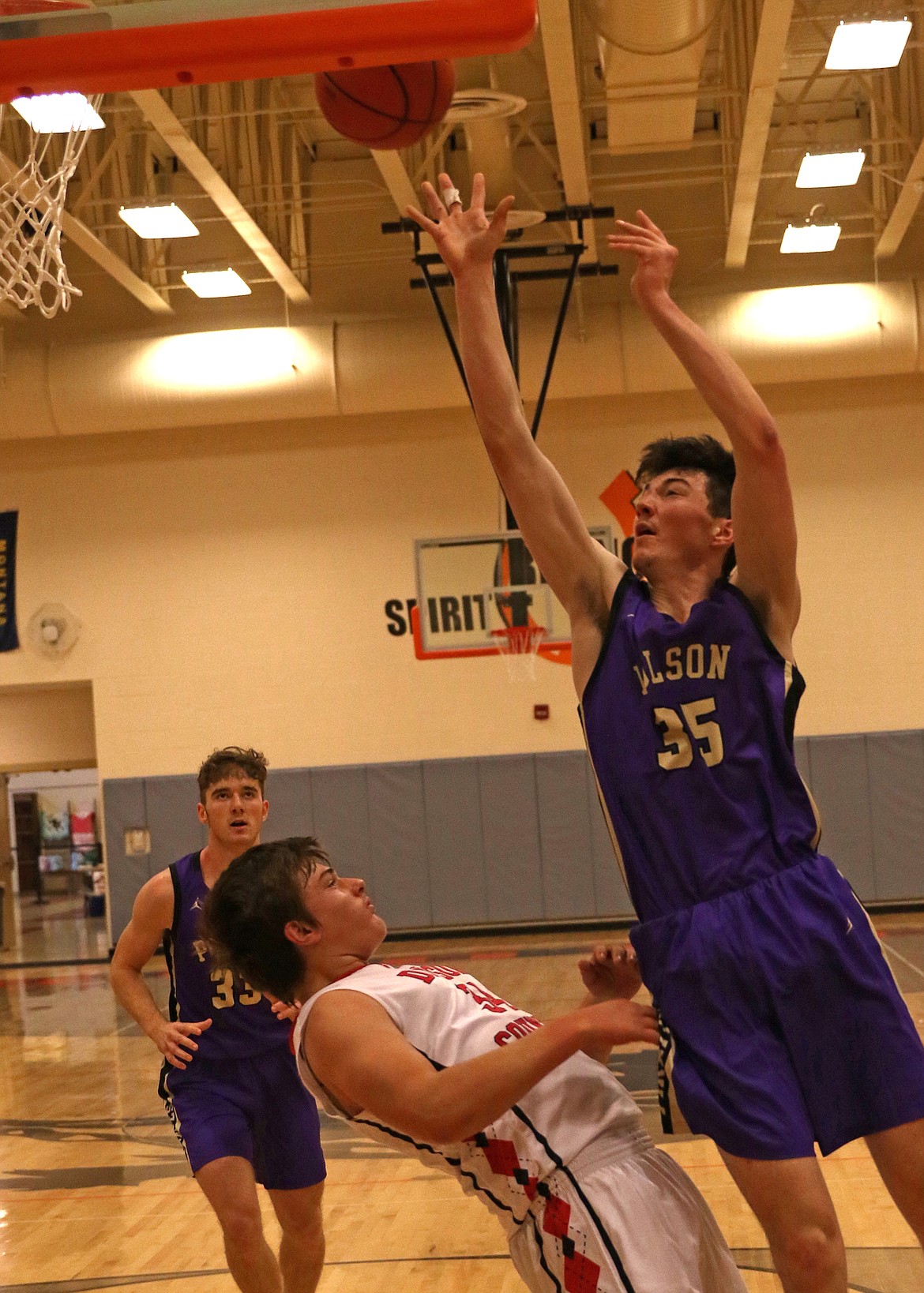 Polson Pirate center Gunner Grisak reached double figures against Glendive Saturday morning at the tip off tournament. (Photo by Bob Gunderson)