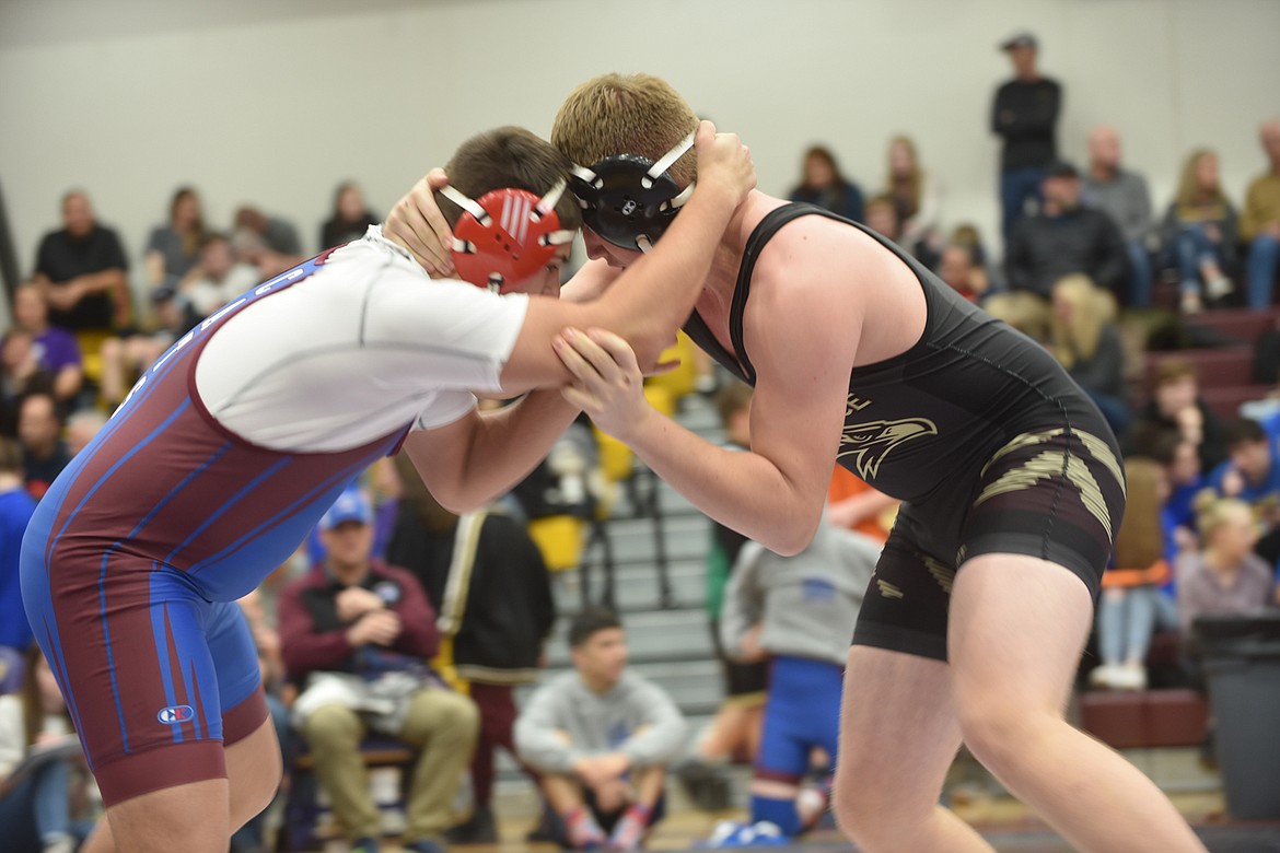 Clark Fork Mountain Cats wrestler Chandon Vulles tangles with Florence&#146;s Jared Pallo during their match at 205 pounds Friday at the Owen Invitational at Salish Kootenai College in Pablo. Vulles scored a pin in 1:22. (Scott Shindledecker/Mineral Independent)