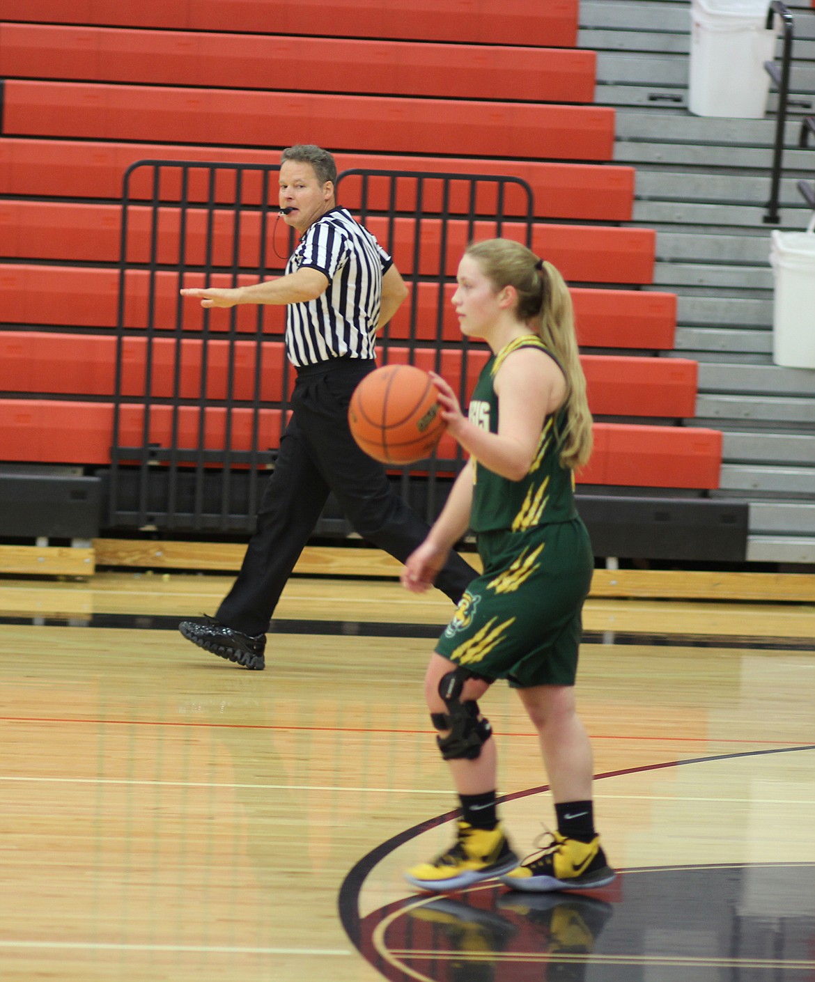 St. Regis senior Kylee Thompson brings the ball upcourt at the Ronan tip-off tournament. (Chuck Bandel/Mineral Independent)