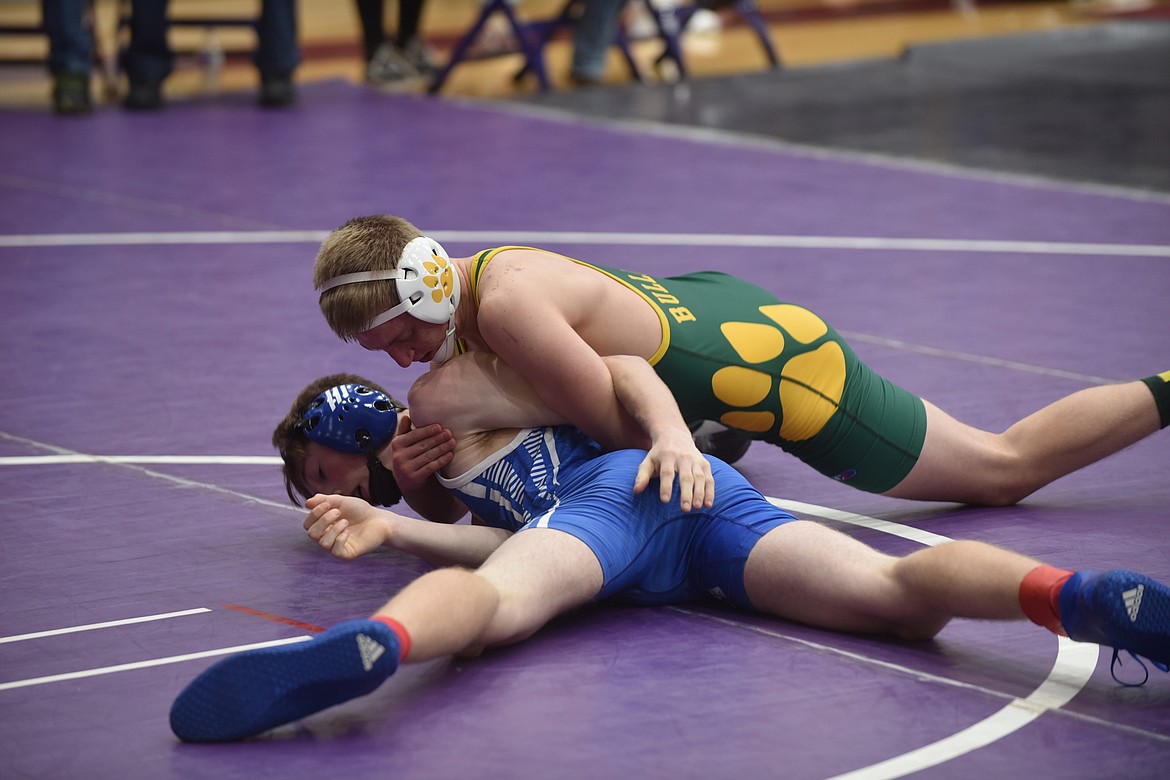 Carter Moran wrestles his oppenent to the mat during the Owen Invitational in Polson last week. (Scott Shindledecker/Whitefish Pilot)