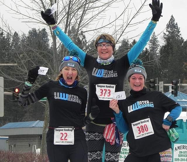 From left, running friends Sandra Graf, Kari Kelli and Debbie Medlen spread their New Year&#146;s Day enthusiasm during the Tesh, Inc. 2018 Hangover Handicap in downtown Coeur d&#146;Alene. (Courtesy photo)