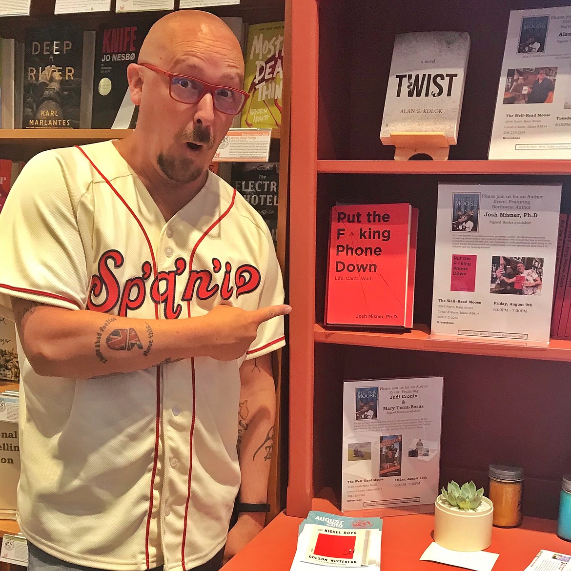 Courtesy photo
Communication professor, author and TEDx speaker Josh Misner points to his book, &#147;Put the F**king Phone Down,&#148; after it launched at the end of May. In this book, Misner shares techniques and activities people can use to unglue from their devices and share more meaningful interpersonal moments. &#147;Some of the most impactful moments in life will not beg for our attention,&#148; Misner said.