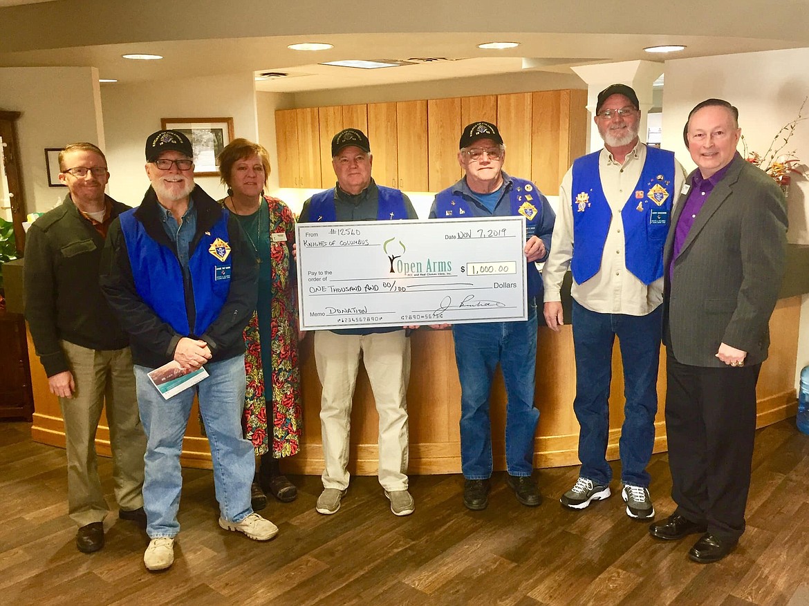 The Knights of Columbus recently donated $1,000 to the Open Arms Pregnancy Support Center in Coeur d&#146;Alene. The center offers ultrasound services and provides a variety of other types of assistance to newly expectant often single mothers. From left is Support Development Manager Roger Garlock, Mike Mackin, Promotions Manager Diane Samson, Steve Gonnella, Larry Noska, Harry Cosseboom and Executive Director Dr. Richard Hawk.