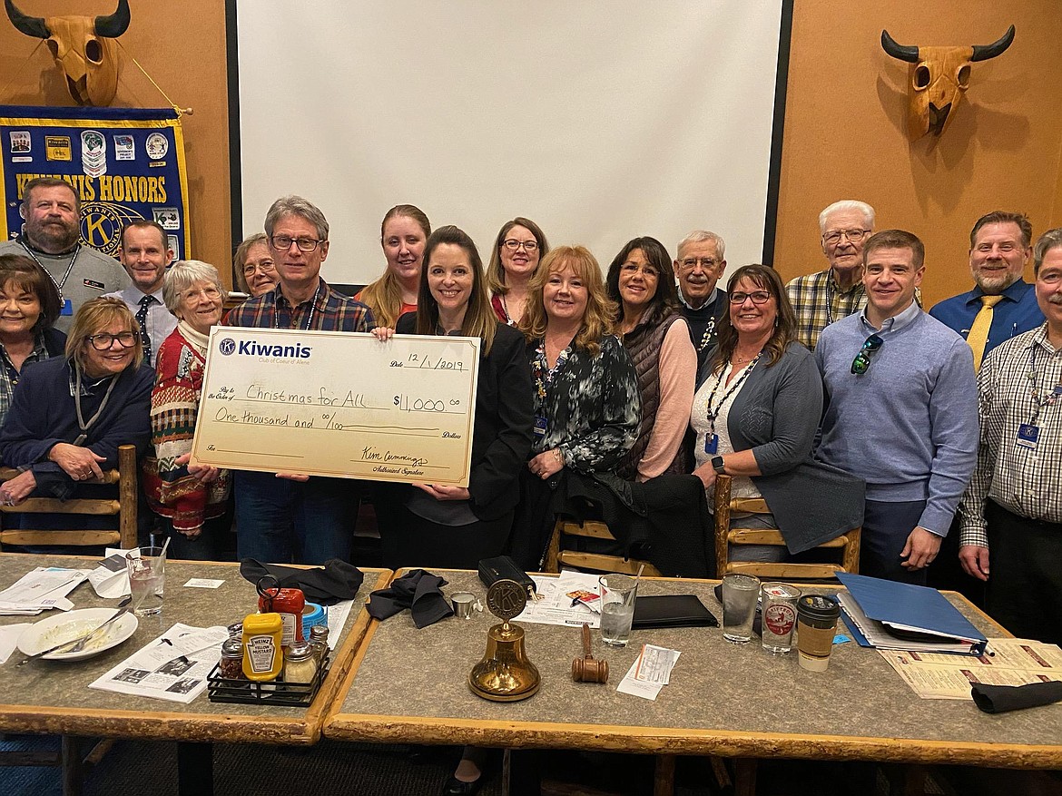 The Coeur d'Alene Kiwanis recently presented a check for $1,000 to the Press Christmas for All program. 
Front row: Ardyce Plumlee, Jill Jurvelin, Matt Palmer, Kim Cummings, Carolyn Jorgensen, Michelle Gonzales, Angela Erickson, Chad Krahn and Marty Behm.
Second Row: Bethann Matousek, Tom Pool, James Curb, Lavonne Vinson, Jessica Letus, Megan Tollackson, Dick Jurvelin, Karl Schimdt and Kevin Casey. (Courtesy photos)