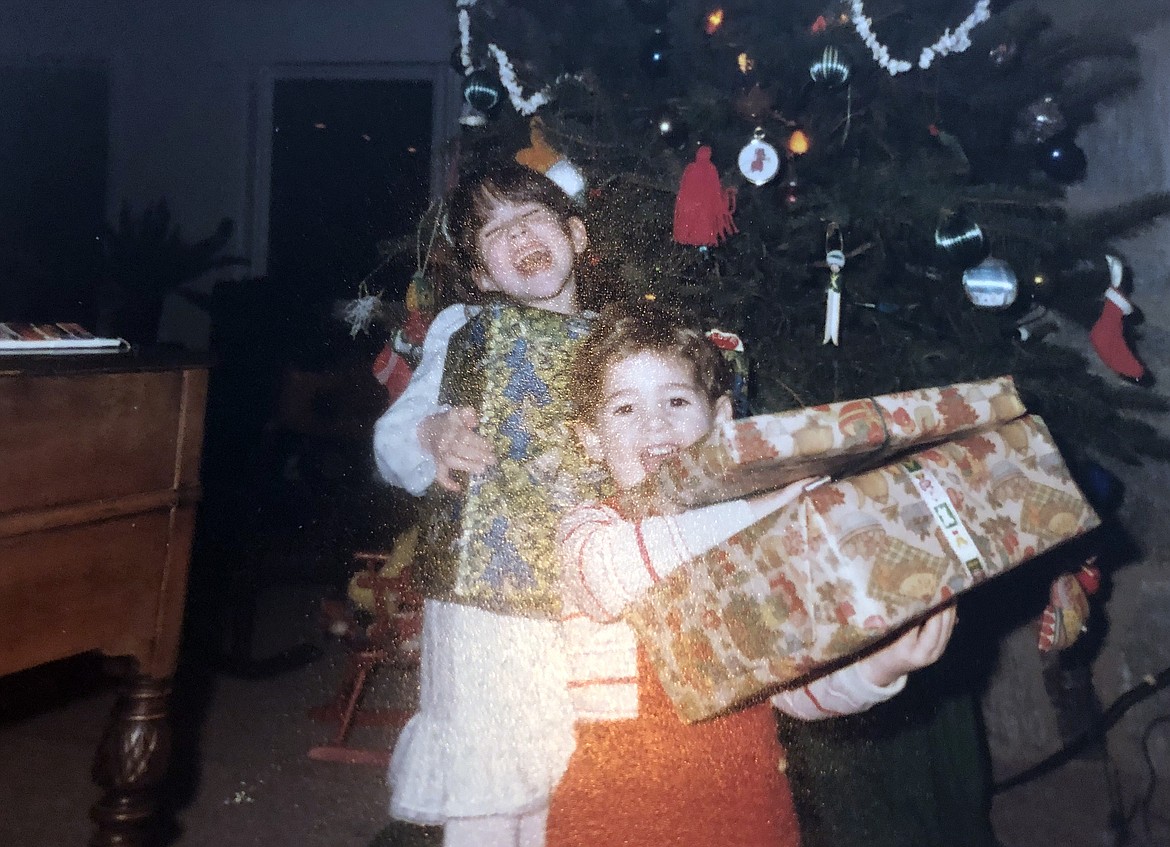 Matt Baldwin and his sister Jessica Baldwin celebrate Christmas sometime in the early 1980s.