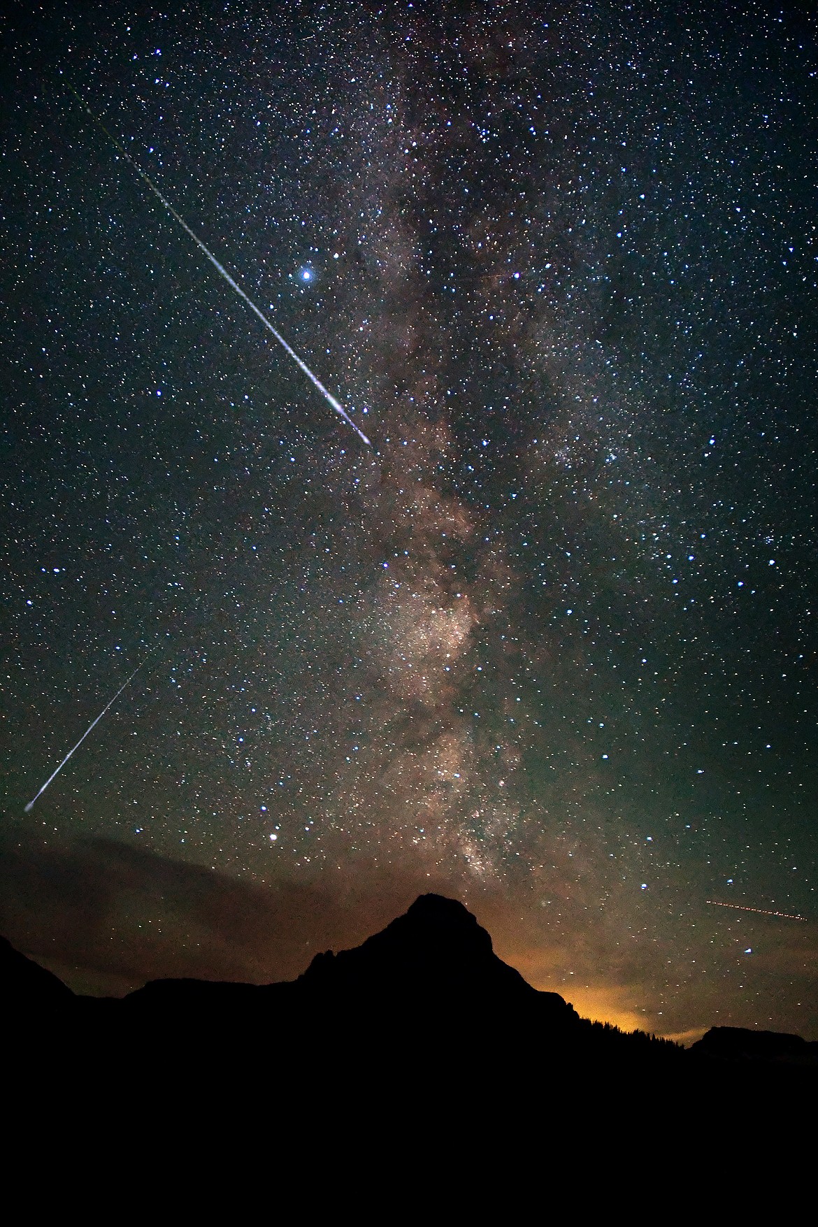 Meteors cut across the sky above Reynolds Mountain in Glacier National Park early Thursday Morning. (Jeremy Weber photo)