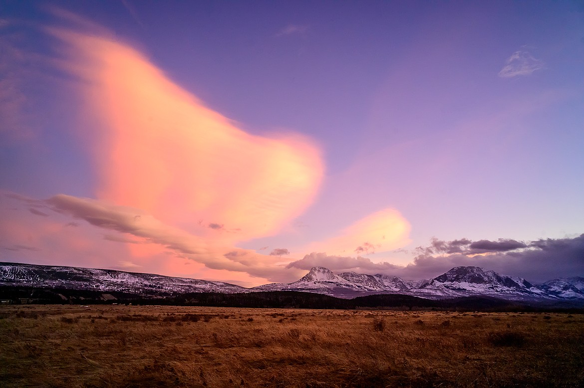 A lenticular cloud hangs over the prairies of St. Mary.