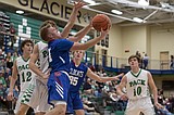 Wildcats have a tough go against Wolfpack on the road