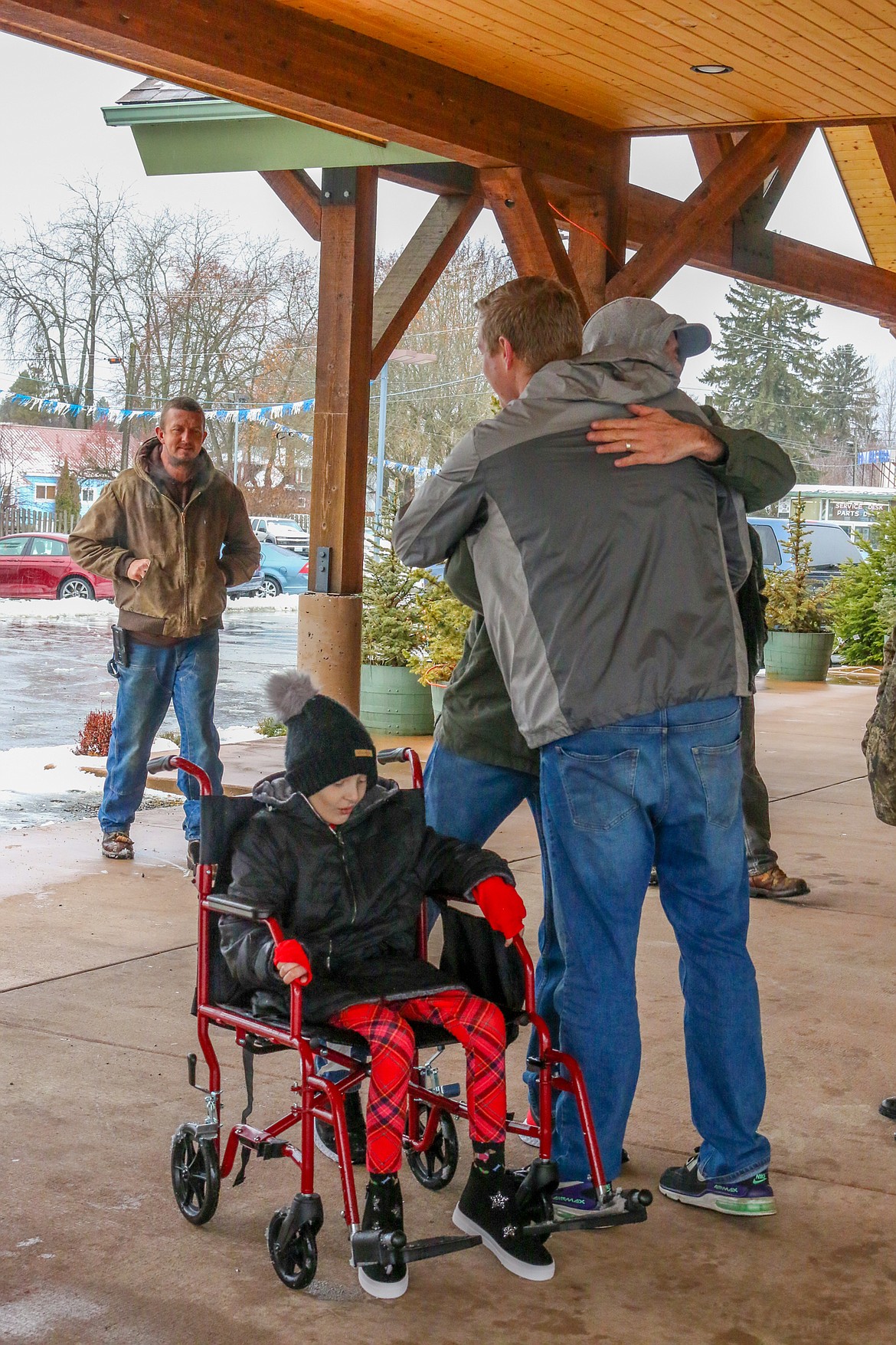 Photo by MANDI BATEMAN
Paisley arrived in a wheelchair, but quickly got up and mingled with people.