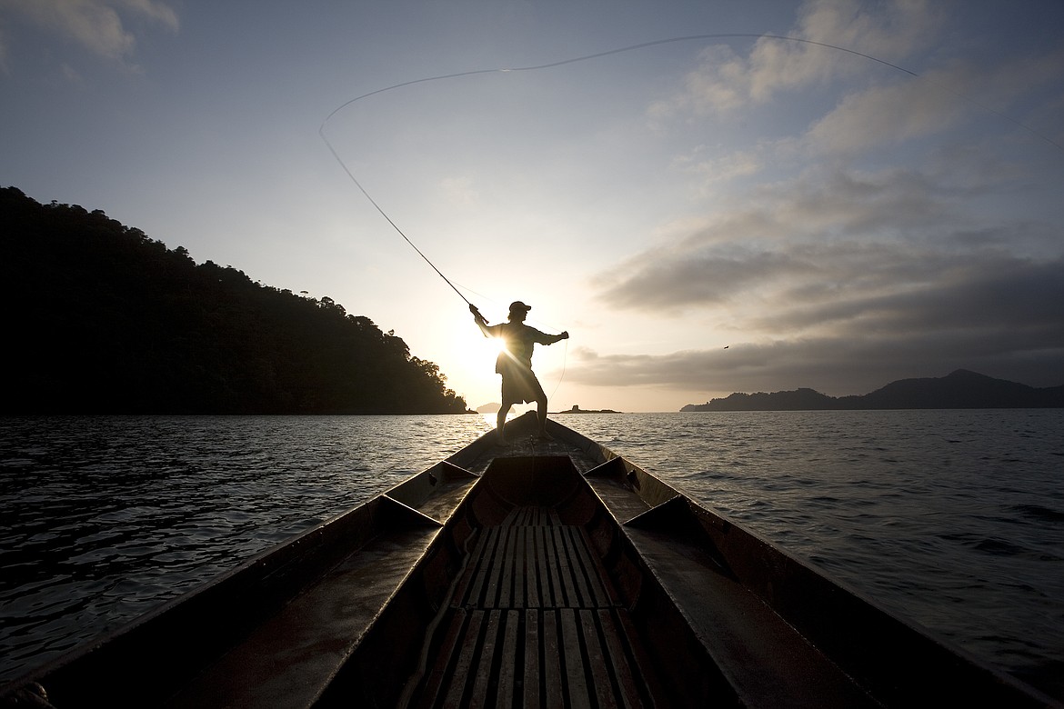 Professional Angler Dan Cook off the Pacific coast of Panama near the Darian Gap by Andrew Geiger. This image was shot for ExOfficio travel clothing company.