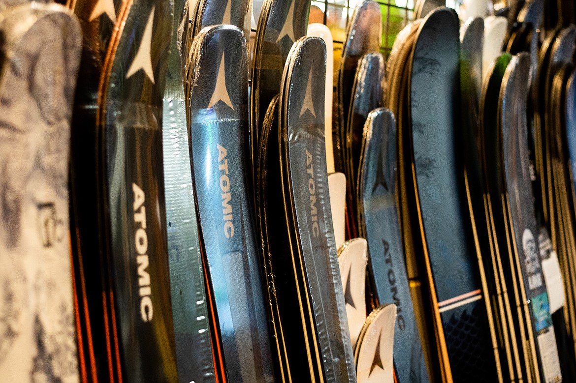 Skies lined up along the wall of the Tamarack Ski Shop. (Daniel McKay/Whitefish Pilot)