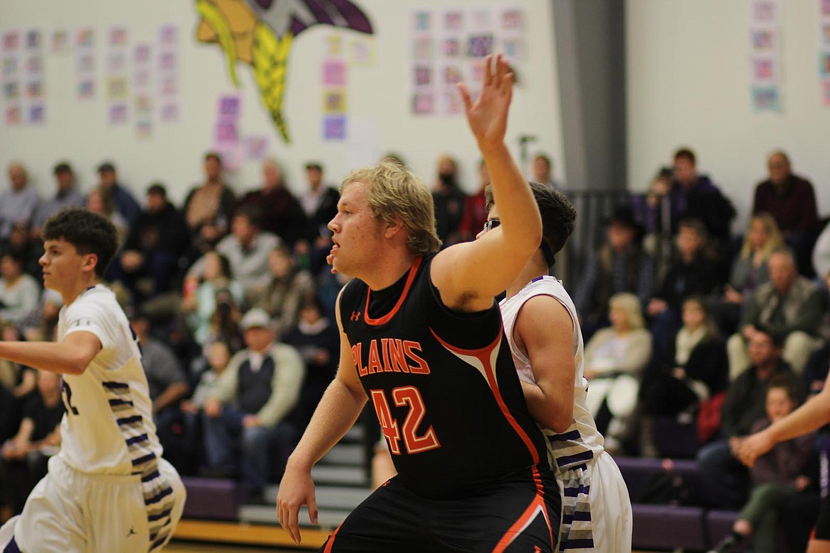 Plains big man Parker Flock (42) calls for the ball inside against Charlo. Flock helped the Horsemen to a big win over the Vikings. (Chuck Bandel/Valley Press)