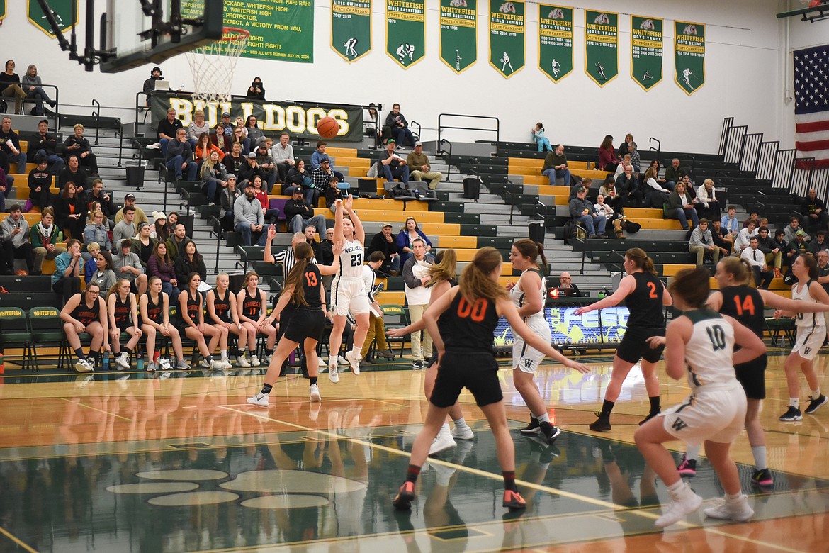 Gracie Smyley fires a three during Thursday's battle against Eureka. (Daniel McKay/Whitefish Pilot)