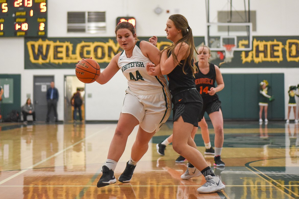 Hope Brown drives to the hoop during Thursday's battle against Eureka. (Daniel McKay/Whitefish Pilot)