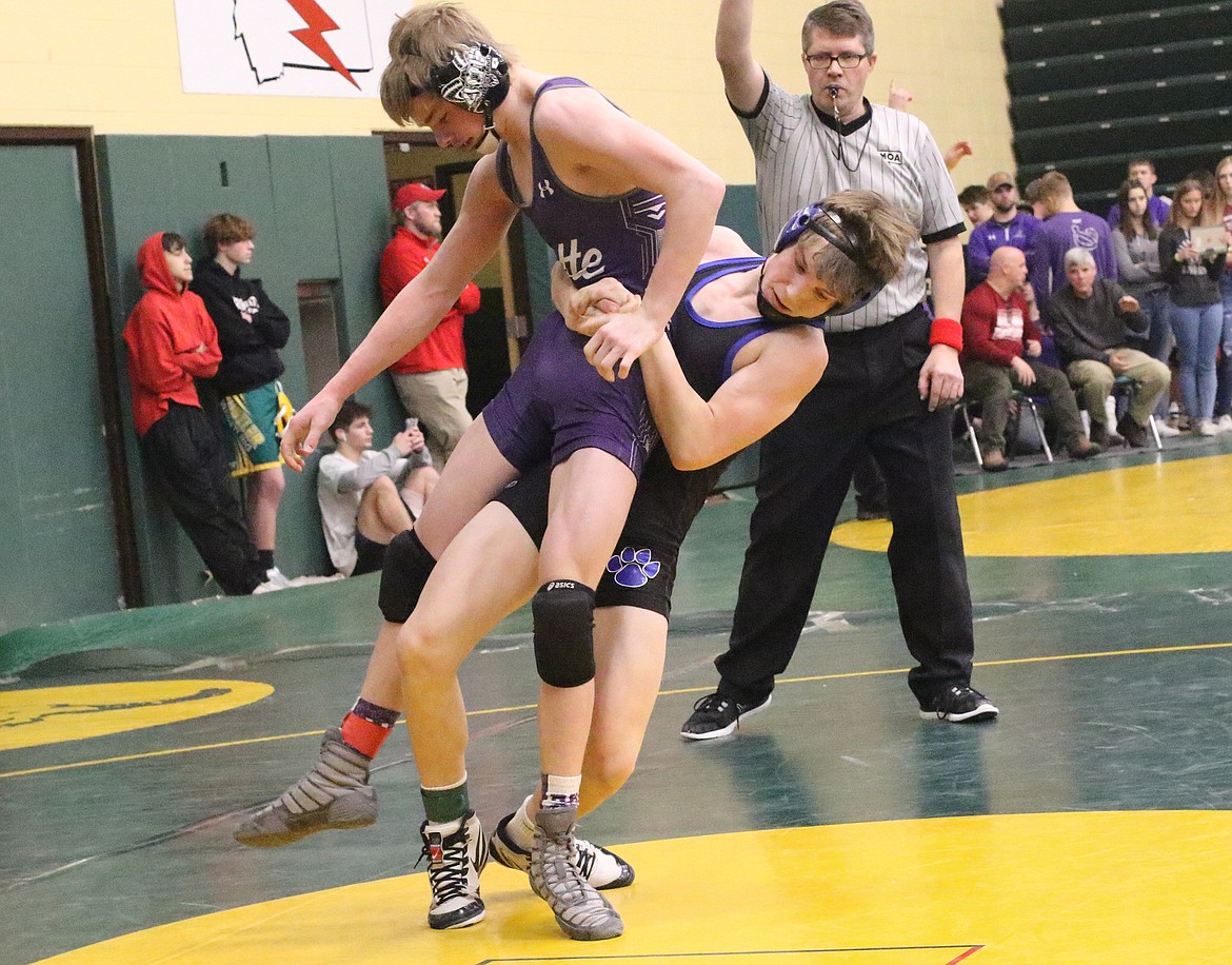 Orion Barta battles Butte&#146;s Keagan Gransbery at the CM Russell Holiday Classic in Great Falls Saturday. (Bob Windauer photo)