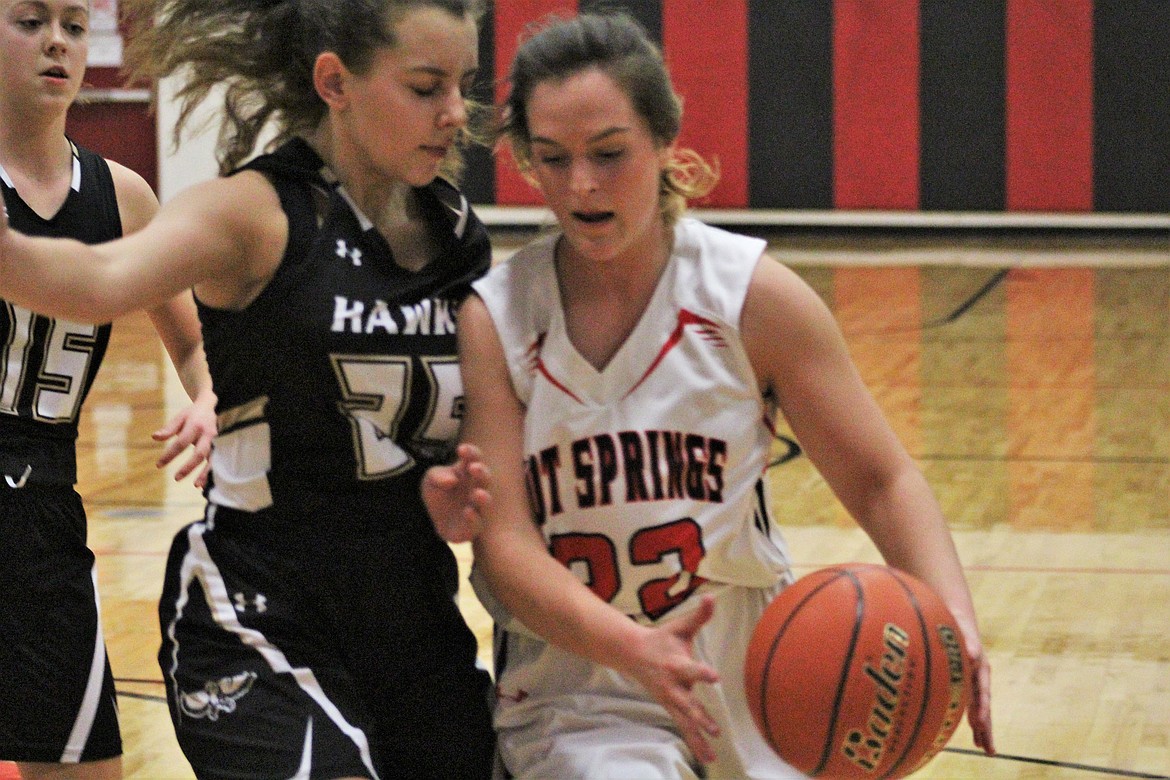 SAGE JACKSON (22) works her way around Seeley-Swan&#146;s defense last Friday night. (John Dowd/Clark Fork Valley Press)