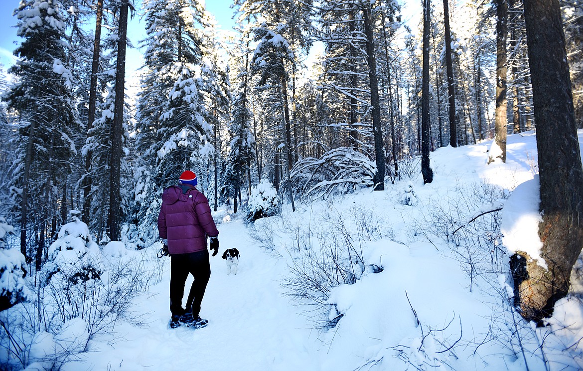 Bob Padgham of Whitefish goes out for a morning hike with his dog on the Lion Mountain trail in Whitefish on Wednesday, December 28.
(Brenda Ahearn/Daily Inter Lake)