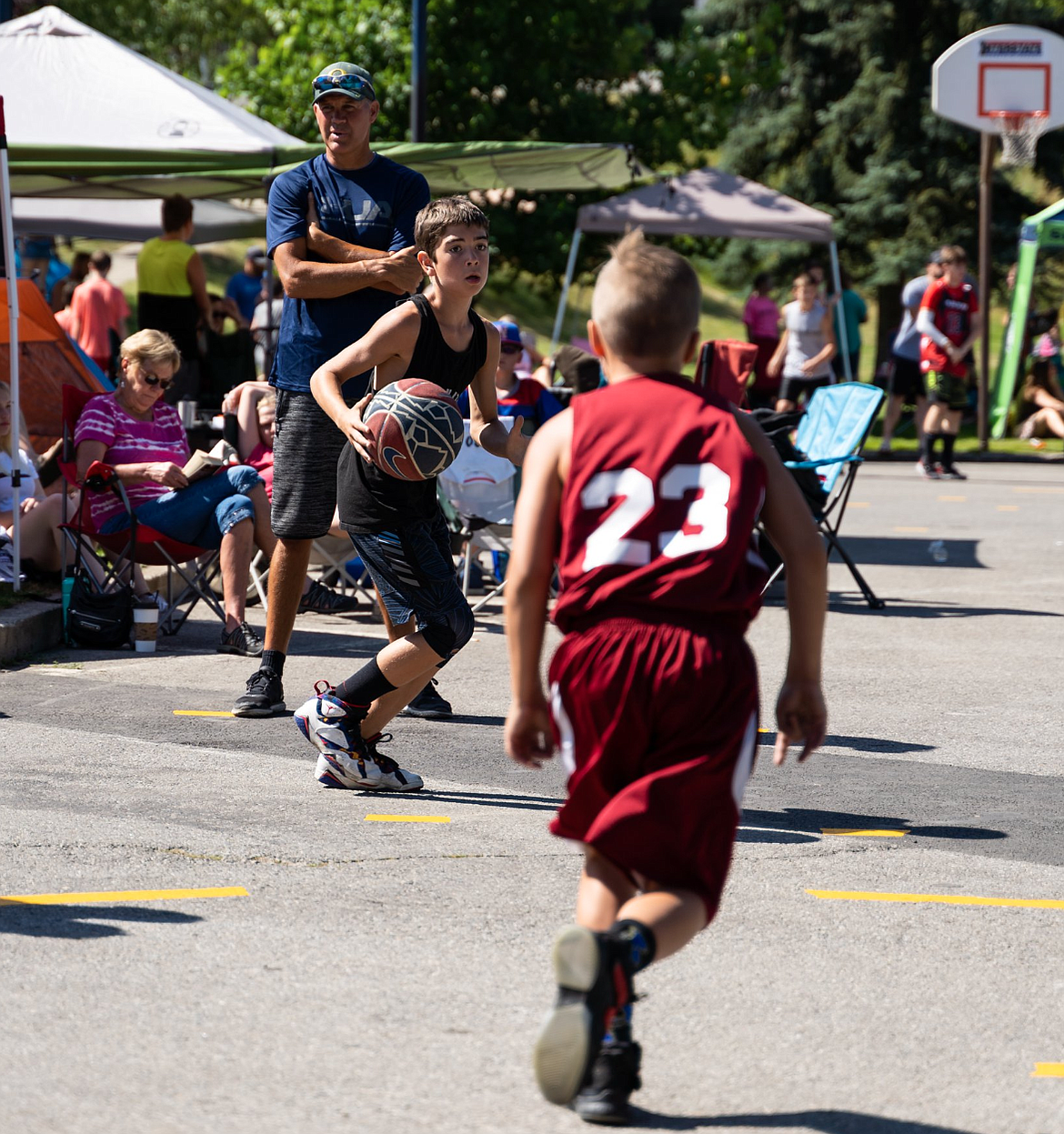 Photo by NATHAN DUGAN
Radley Groth (dribbling) was one of nearly 600 players who competed at July&#146;s SilverHoops 3-on-3 Tournament in Kellogg.