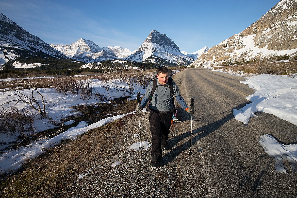 A hiker walks along Many Glacier Road, which will be reconstructed over a two-year period starting in April. (Hungry Horse News file photo)