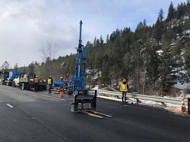 Photo by CHANSE WATSON/
Road crews on Interstate-90 work in February to determine the cause of the dips.