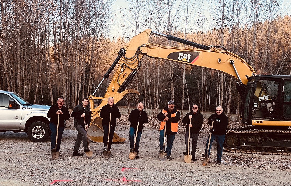 Photo by JOSH McDONALD
After announcing its purchase of land in Pinehurst in April, Real Life Ministries held a groundbreaking ceremony in November for its new facility. Pictured (from left) holding shovels are church elders Brad Kitchen, John Cook, Larry Curry, Pastor Gene Jacobs, Don Ferguson, John Wohlman and Richard Jansen.